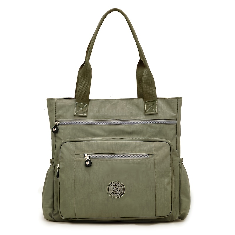 A Minimalist Shoulder Bag Made Nylon Featuring a Large