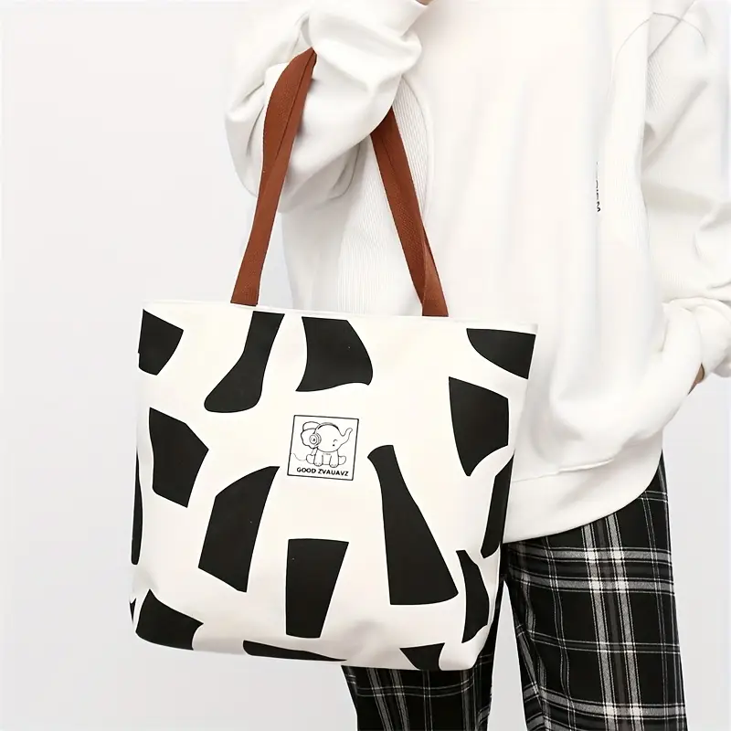 stylish geometric print womens oxford tote bag durable shoulder bag with zipper closure shopping travel commuting in white yellow black commuting accessory modern accessory fabric details 1