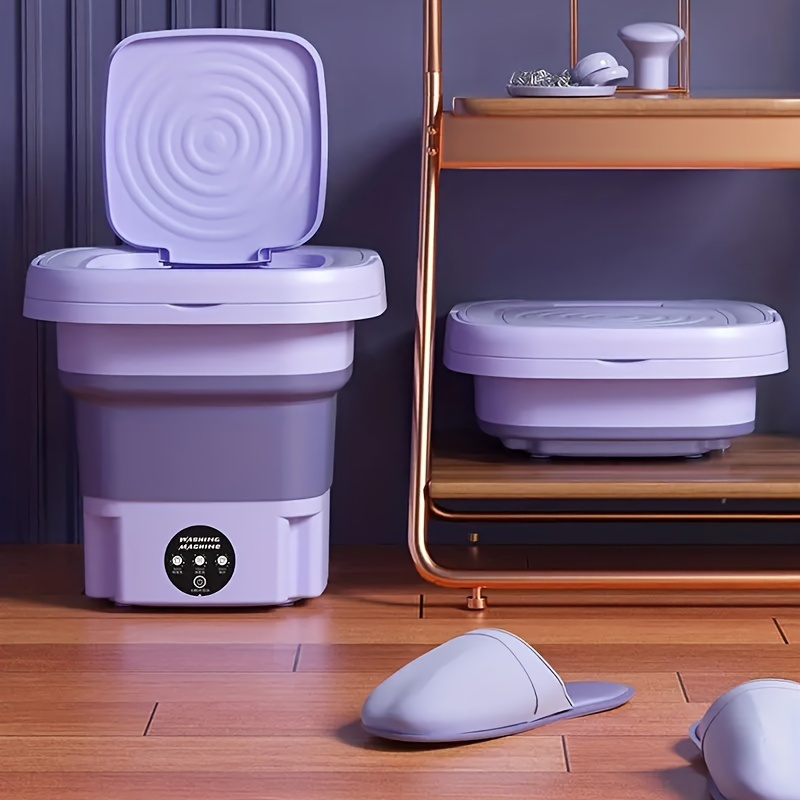 Mini wasmachine in gebruik